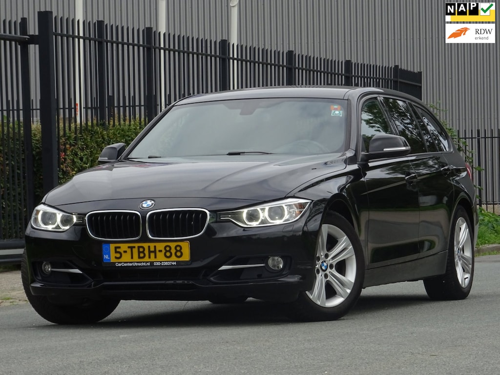 BMW 3-Serie Touring 320i High Executive NAP/HEAD-UP/LEER/NAV