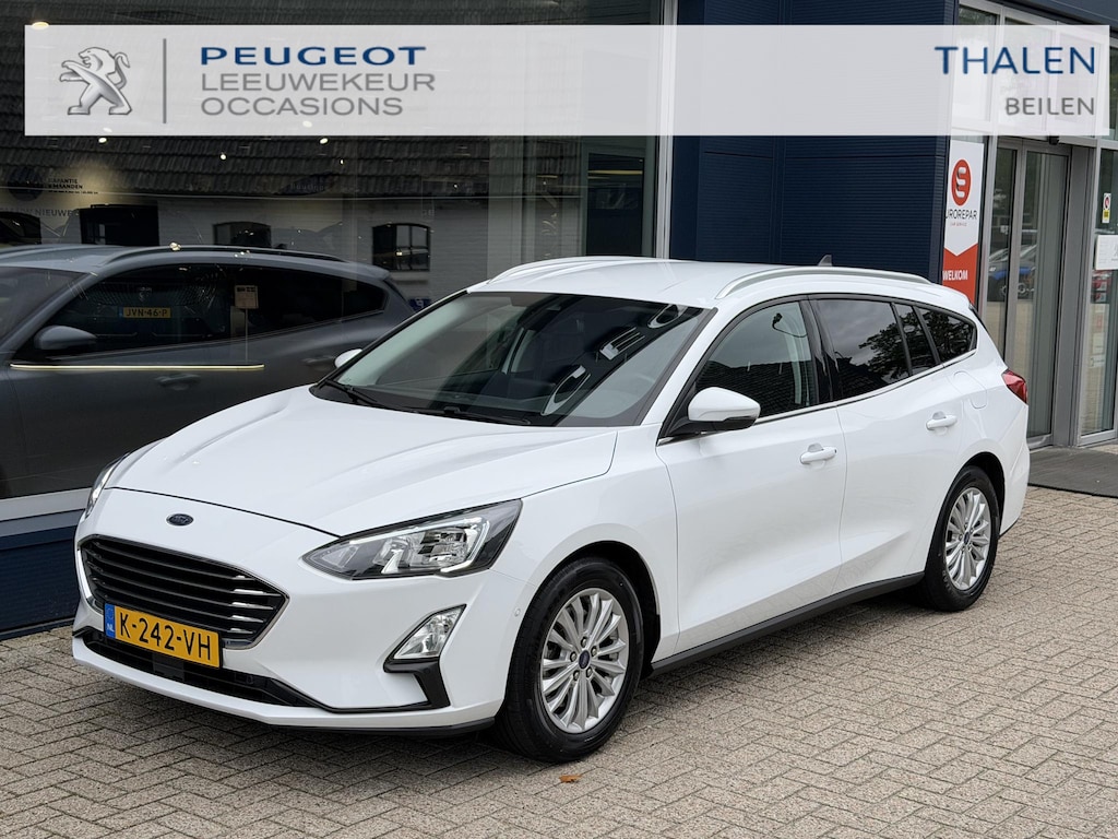 Ford Focus Wagon 1.0 EcoBoost Hybrid 155 PK Titanium X Business | Wegklapbare Trekhaak | Electrische Kofferklep | | Stuur & Stoelverwarming | Navigatie | Apple Carplay | Keyless entry | Lichtmetaal | Parkeersensoren | Cruise Control | Climatie Control | Camera