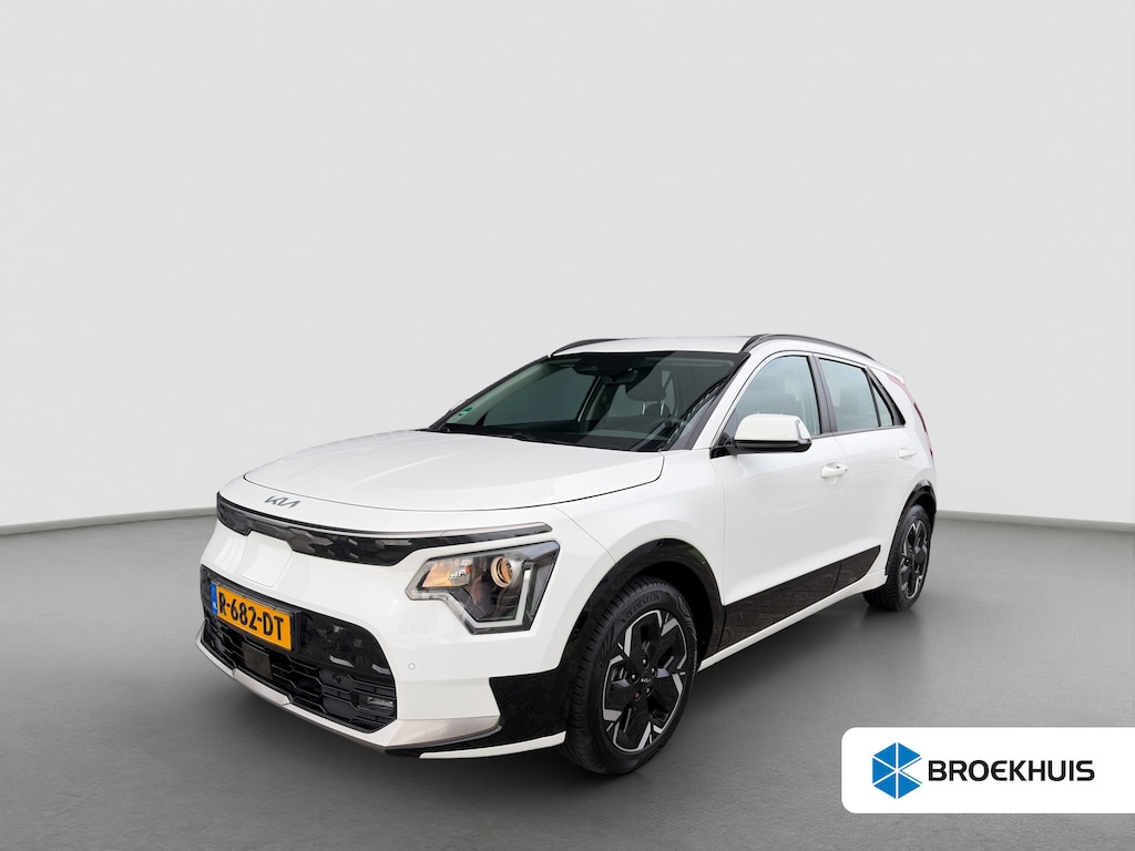Kia Niro EV DynamicLine 64.8 kWh 204pk | SOH 100% | Carplay | Camera | Trekhaak | Halfleder | Adaptive Cruise | DAB | Navigatie | Keyless entry | Climate control | Regensensor