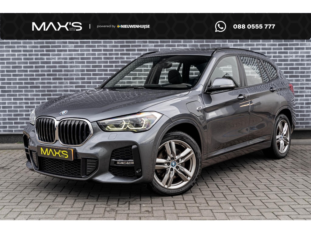 BMW X1 xDrive25e High Executive | M-Sport | Plug-in Hybrid (PHEV) | Panoramadak | LED Koplampen Adaptief | Cruise Control Adaptief | Achteruitrijcamera | Parkeerassistent | Head-up Display | Sportstoelen | Keyless Entry | Elektrische Achterklep | Navigatie