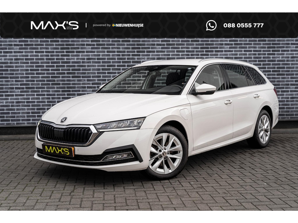 Skoda Octavia Combi 1.4 TSI iV PHEV Business Edition | Plug-in Hybrid | Achteruitrijcamera | Parkeersensoren | Keyless Entry | Sunset Glas | Stoelverwarming voor en achter | Lichtmetalen Velgen 17 inch | Navigatie | Apple Carplay | Android Auto