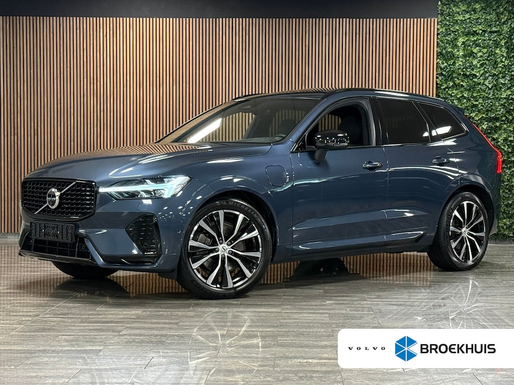 Volvo XC60 T8 AWD Recharge Plus Dark | Luchtvering | Trekhaak | 360° Camera | Harman Kardon | 455pk | Adaptieve Cruise Control | Stoelverwarming voor+achter | Stuurwielverwarming | Full LED Meesturende koplampen | Pilot Assist | BLIS Dode Hoek Detectie | Standkachel met Volvo On Call App | Elektrische voorstoelen geheugen | R-Design Contour stoelen met wit stiksel en bies | Zitting verlenging voorstoelen | Schuifdak | 20 Inch | Google Infotainment | Keyless Drive | Parkeersensoren voor+achter | Elektrisch bedienbare achterklep | DAB Radio | Apple Carplay/Android Auto | Draadloos telefoon opladen | Volvo On Call met mobiele App functie | Denim Blue Metallic |