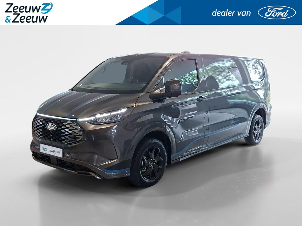 Ford E-Transit Custom 340 L2H1 Sport 71 kWh 218 pk | NIEUW TE BESTELLEN | 17" LM velgen | Laadruimtebescherming | Achteruitrijcamera | All weather banden | Trekhaak | Rijklaarprijs!