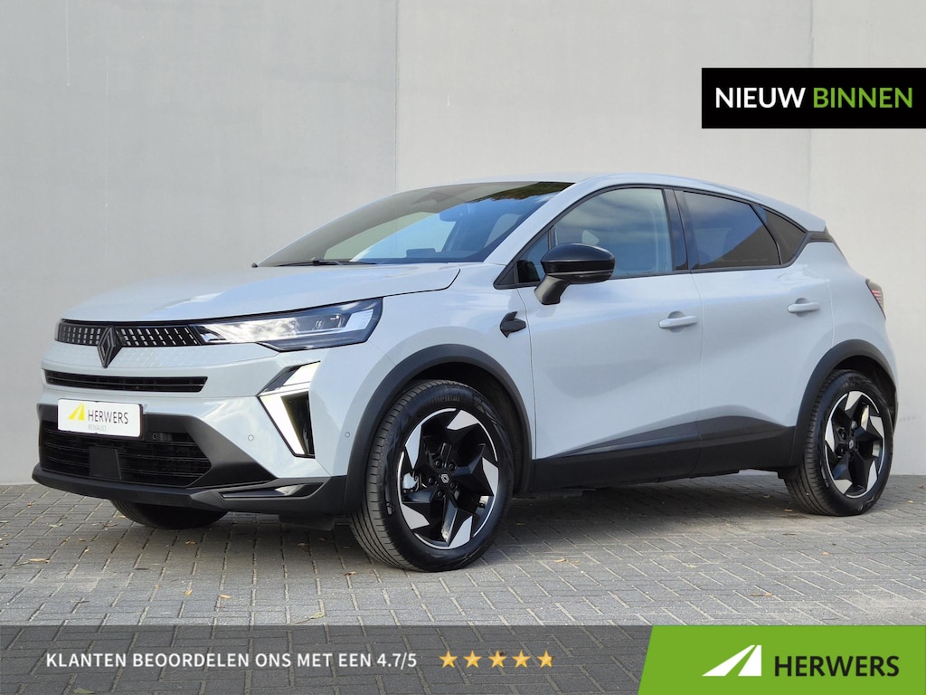 Renault Captur 1.8 E-Tech full hybrid 160 techno / Fabrieksgarantie tot 02-2029 / Pack Winter / Stuur- en stoelverwarming / Navigatie groot scherm / Camera / Climate Control / 18" LM wielen /