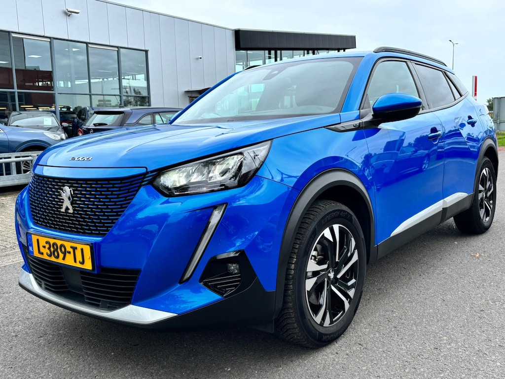 Peugeot e-2008 BWJ 2021 EV Allure 136 PK Pack 50 kWh FULL LED | HALF LEDER | ADAPTIVE CRUISE | CAMERA | KEYLESS | NAVI | CLIMA | CARPLAY + ANDROID | LMV | PDC
