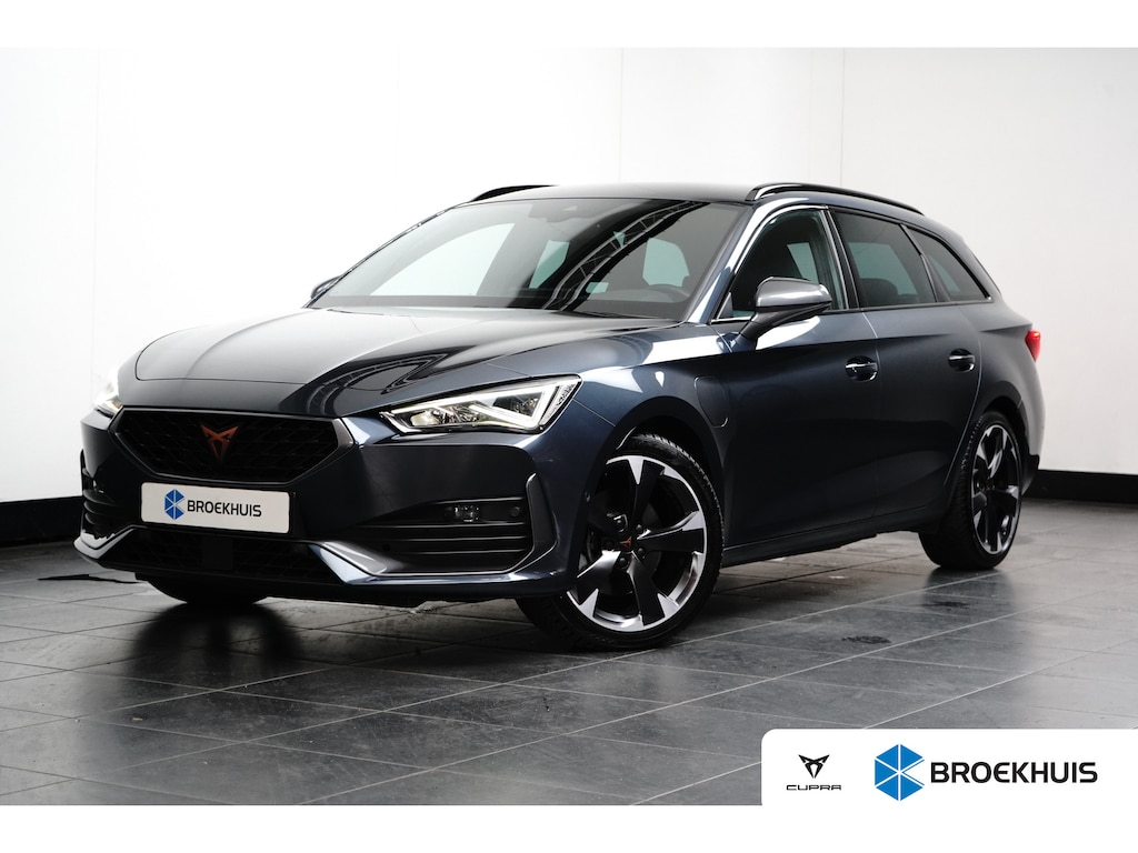 CUPRA Leon Sportstourer e-Hybrid l Camera l Stuurverwarming l Adapt. Cr Control l Full LED l 18" l PDC V & A l Navigatie l Appla Car PLay / Android l