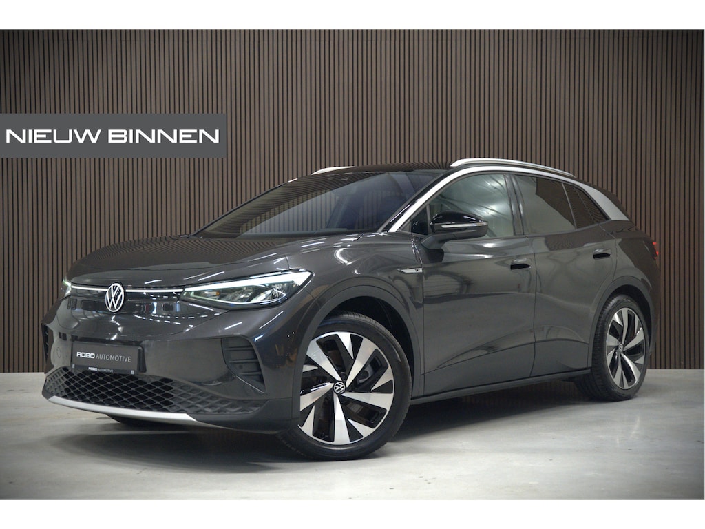Volkswagen ID.4 First 77 kWh | Stoelverwarming | Stuurverwarming | Adaptive Cruise Control | Navigatie | Apple Carplay | Keyless | Camera | Parkeersensoren | NAP | BTW | SOH 92,01%