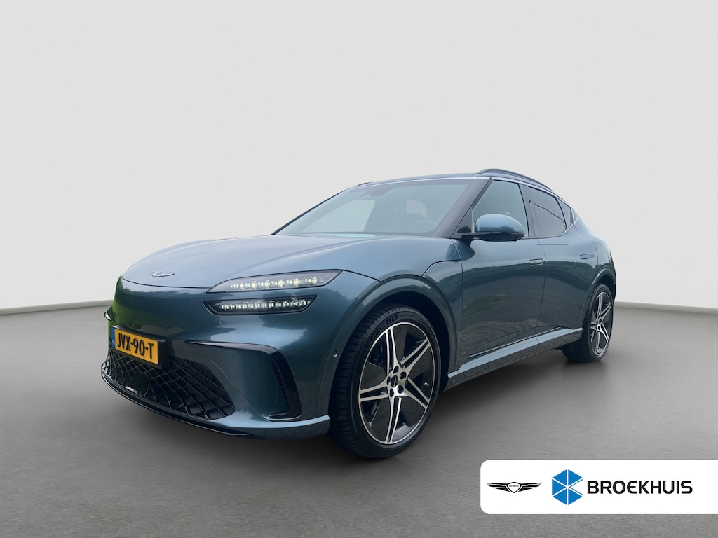Genesis GV60 Performance Dual Motor Luxury 84 kWh 490pk | B&O Audio | Bestuurdersstoel met geheugen | Stoelventilatie | Dodehoekdetectie | Elektrische achterklep | Full LED | Leder | Panoramadak | 360 graden camera | Warmtepomp | Vehicle to Load | Stuurverwarming