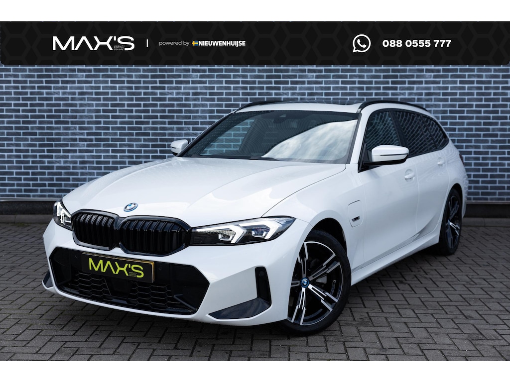 BMW 3-Serie Touring 320e | M-Sport | Panoramadak | Trekhaak | Sportstoelen | Parkeersensoren | Lichtmetalen Velgen 18 inch | Stoelverwarming | Cruise Control Adaptief | Dodehoekdetectie | Live Cockpit Plus | Connected Professional | Plug-in Hybrid (PHEV)