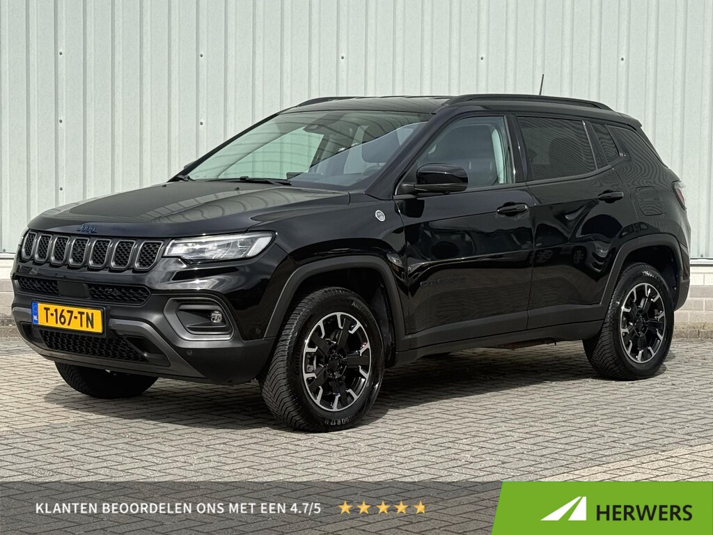 Jeep Compass 4xe 240 Plug-in Hybrid Electric Trailhawk / Stoel/Stuurverwarming / Stoelventilatie / All Season banden / Lederen bekleding / Geheugenstoelen / 360 Camera / Alpine Audio Systeem /
