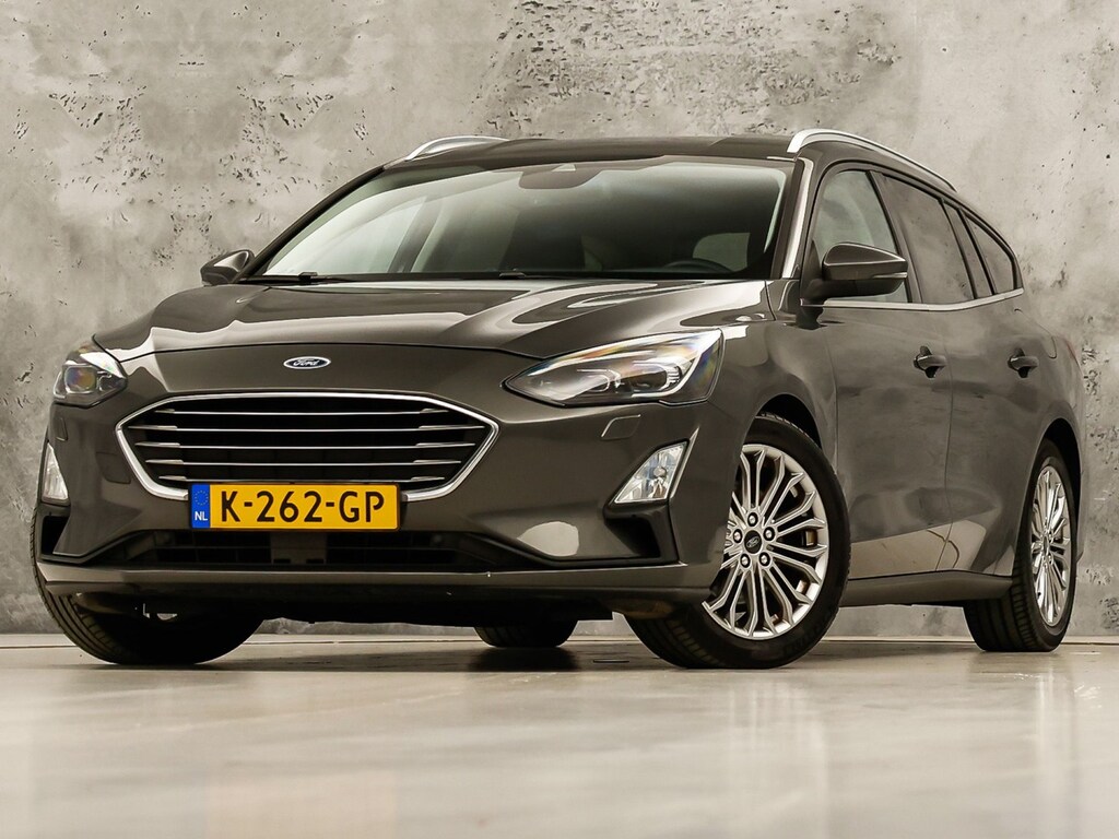 Ford Focus Wagon 1.0 EcoBoost Titanium Sport (APPLE CARPLAY, GROOT NAVI, STUUR/STOELVERWARMING, CAMERA, SPORTSTOELEN, GETINT GLAS, ADAPTIVE CRUISE, NIEUWSTAAT)