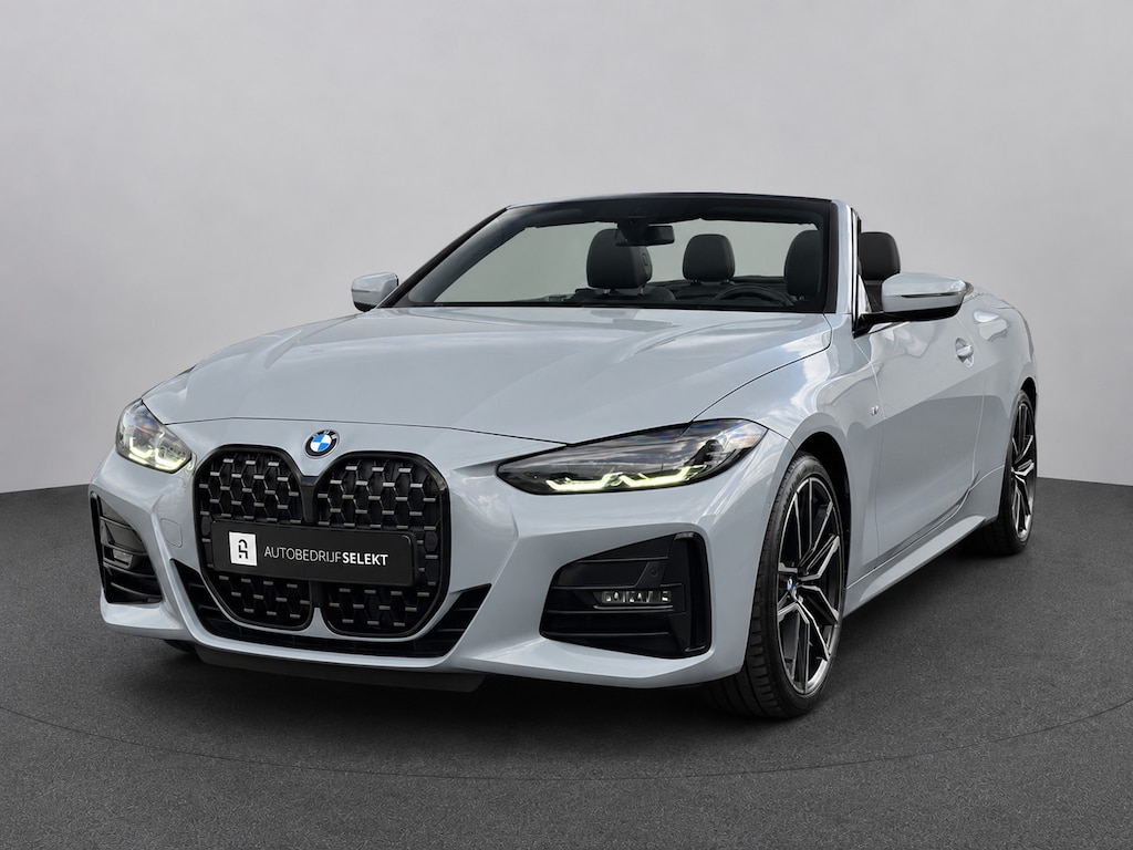 BMW 4-Serie Cabrio 420i M-Sport | Brooklyn Grey | Harman Kardon | 19 inch | Facelift | Widescreen | Stoelverwarming | Carbon