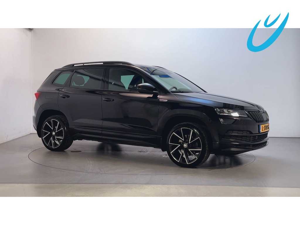 Skoda Karoq 1.5 TSI DSG ACT Sportline Business Panoramadak Trekhaak Adaptive Cruise Sfeerverlichting