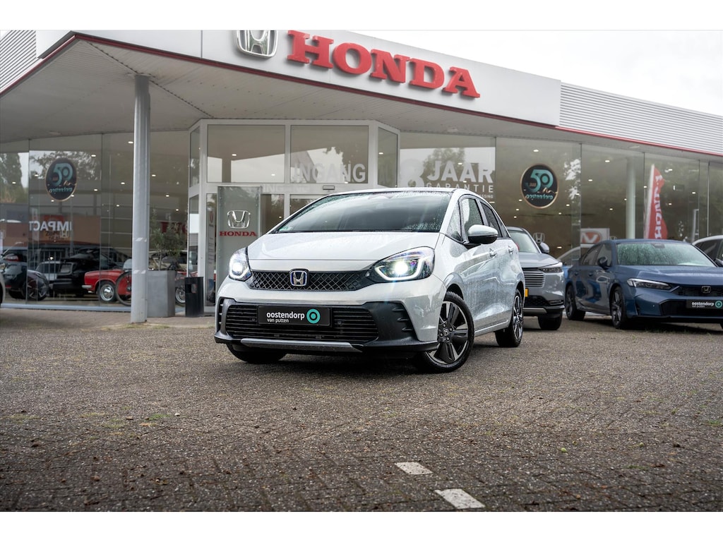 Honda Jazz 1.5 Full Hybrid Advance | Premium Sunlight Silver | verwarmd stuurwiel | Adaptieve cruise control | stoelverwarming | privacy glass