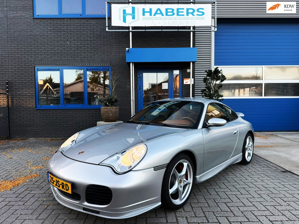 Porsche 911 3.6 Coupé Carrera 4 320PK facelift MK2|Turbo Aeropakket |Cognac leder|AUT|Xenon|Memmory|Schuifdak|Climate|Camera|PDC