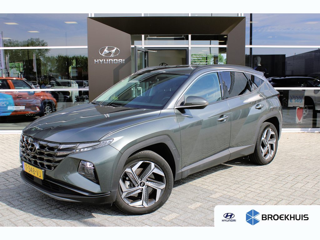 Hyundai Tucson 1.6 T-GDI PHEV Comfort Smart 4WD | Stoelverwarming voor| Stuurwielverwarmig | Navigatie | Climate Control | Achteruitrijcamera | Airco (automatisch) | Apple Carplay/Android Auto|telefoonintegratie premium