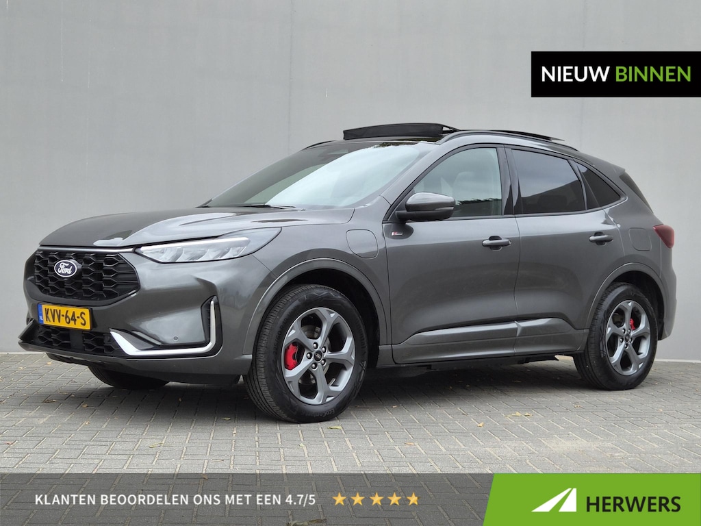 Ford Kuga 2.5 PHEV ST-Line X / Glazen schuif- en kanteldak / Trekgewicht 2.100 kg / Stuur- Stoel & Achterbankverwarming / B&O Audio Systeem / Voorruit verwarming / Elektrische achterklep / Adaptief cruise control / Apple Carplay Android Auto /