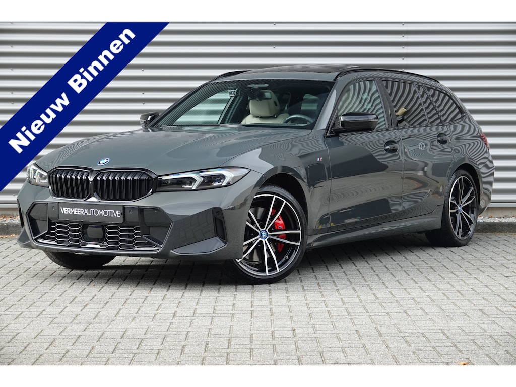 BMW 3-Serie Touring 330e M-Sport Pro | Panodak | Trekhaak | H&K | HUD | Carbon | Memory | ACC |