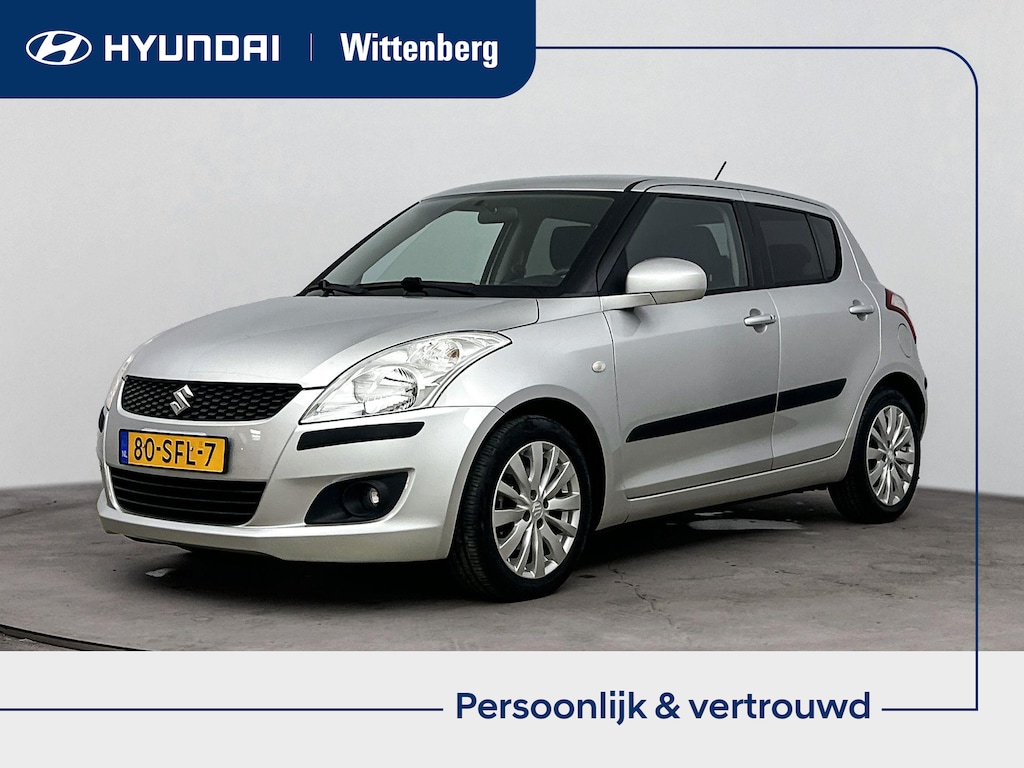 Suzuki Swift 1.2 EXCLUSIVE EASSS | CLIMA | CRUISE | 16'' LM VELGEN | PRIVACY GLASS | ELEKTRISCHE RAMEN VOOR & ACHTER | CENTRALE DEURVERGRENDELING OP AFSTANDBED. |
