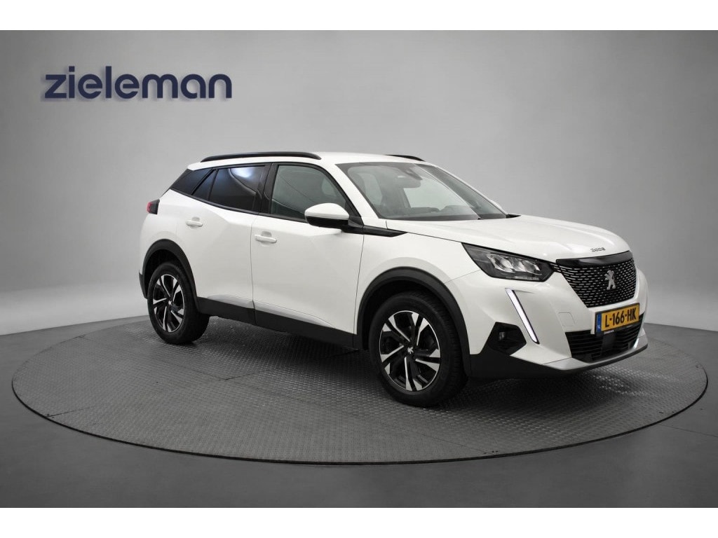 Peugeot 2008 1.2 PureTech Allure Pack - Carplay, Clima, Cruise, Half Leer