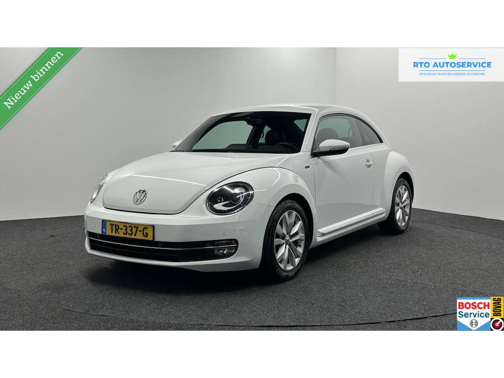 Volkswagen Beetle 1.2 TSI Exclusive Series LEER NAVI CRUISE LM STOELVERWARMING.