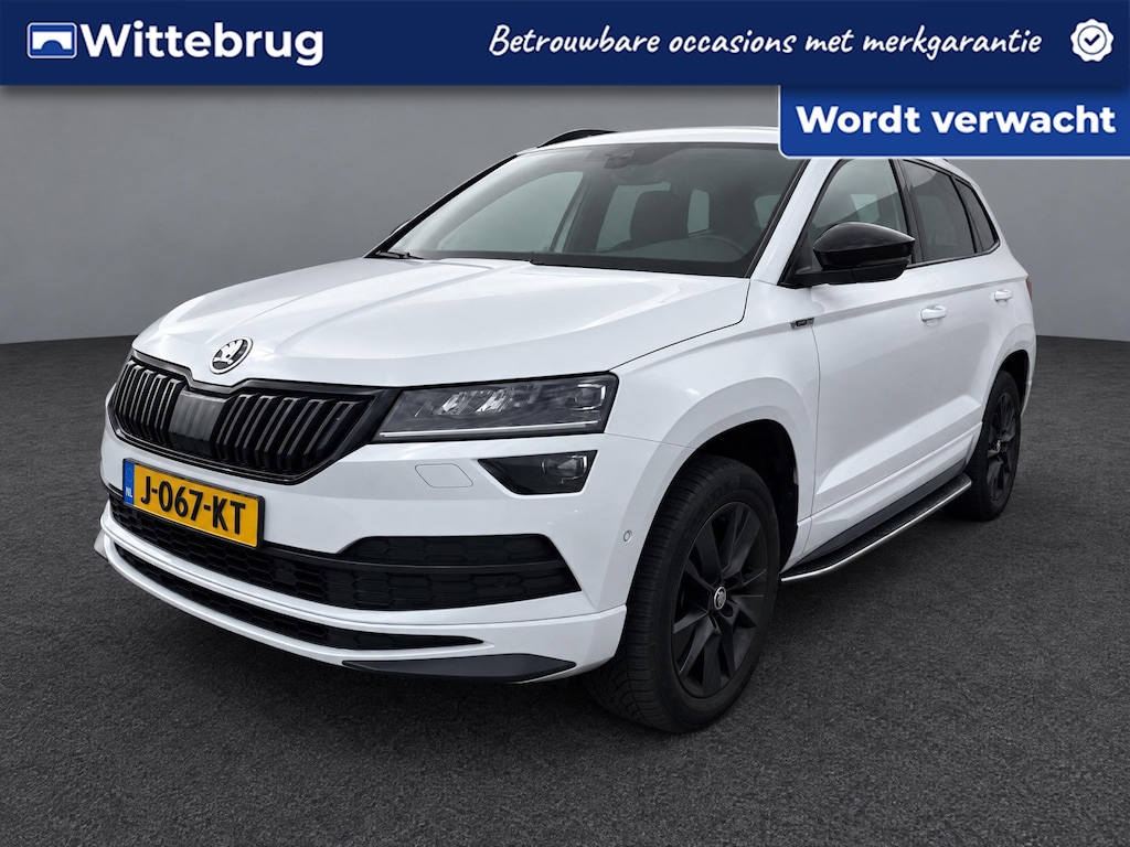 Skoda Karoq 1.5 TSI ACT Sportline Business / Pano / Digitaal dashboard / App connect / Navigatie / Canton sound / Trekhaak /