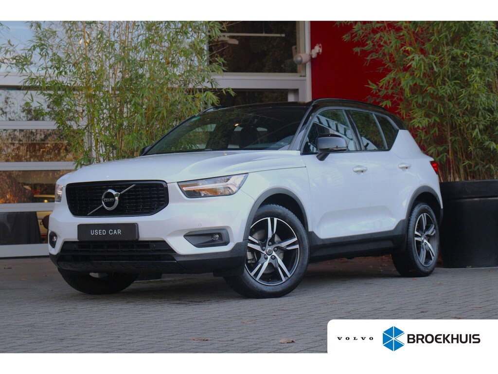 Volvo XC40 2.0 T4 AWD R-Design | Trekhaak | Stuur- en stoelverwarming | BLIS | Memory Seat | Adaptieve Cruise met Stuurhulp | Lava Orange interieur