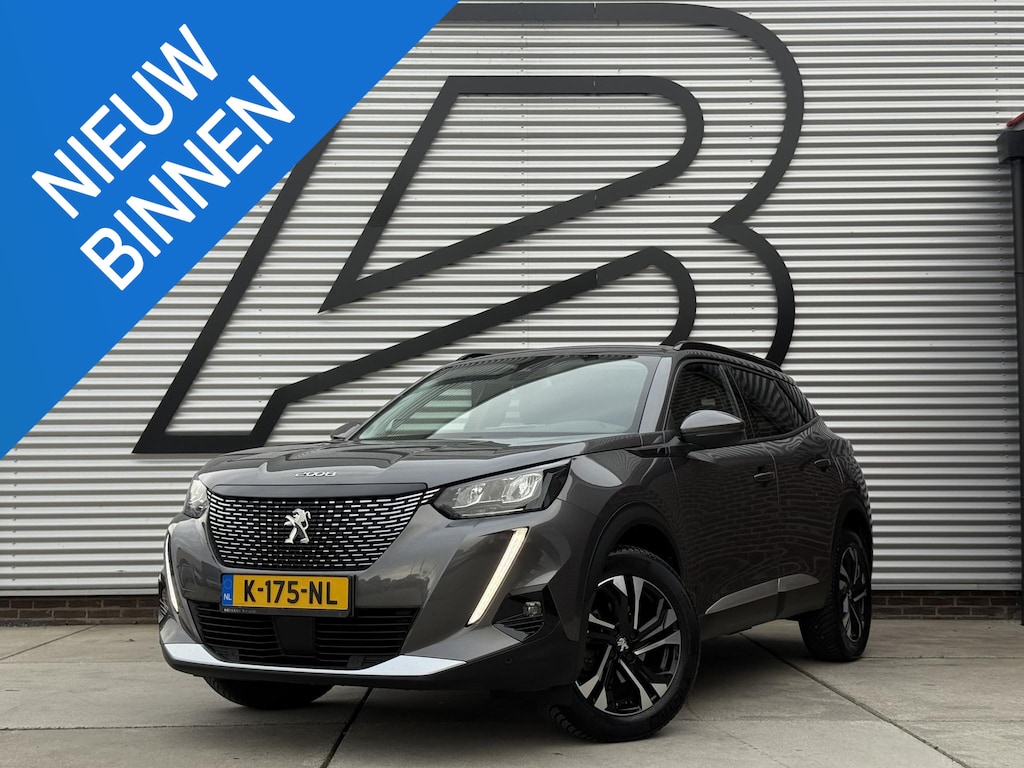 Peugeot 2008 1.2 PureTech Blue Lease Allure 2e Eigenaar|Navi|Camera|D-riem vv in 2025|i-Cockpit|Trekhaak|Cruise|Carplay|Clima|PDC V+A|Elek ramen|Nieuwe APK bij Aflevering