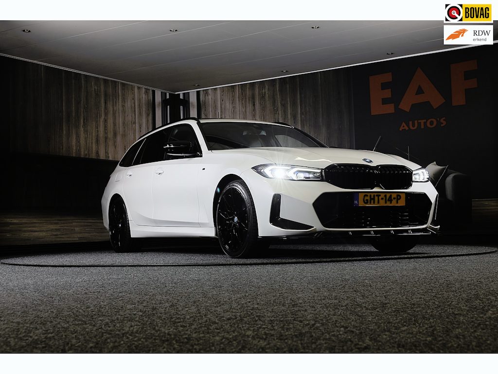 BMW 3-Serie Touring 320e M Line / Head Up / Memory / Navi / Camera / Acc / F1 / Open Panoramadak / Led / Pdc / 19 Inch