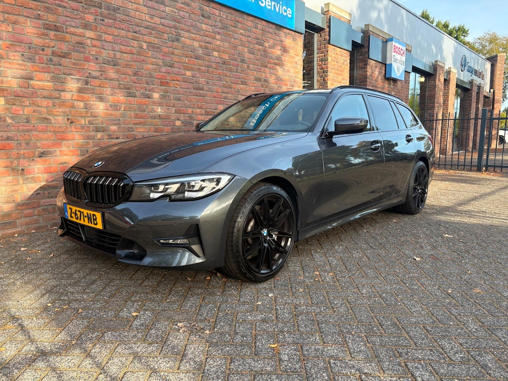 BMW 3-Serie Touring 330i High Executive|Trekhaak|Camera|PDC