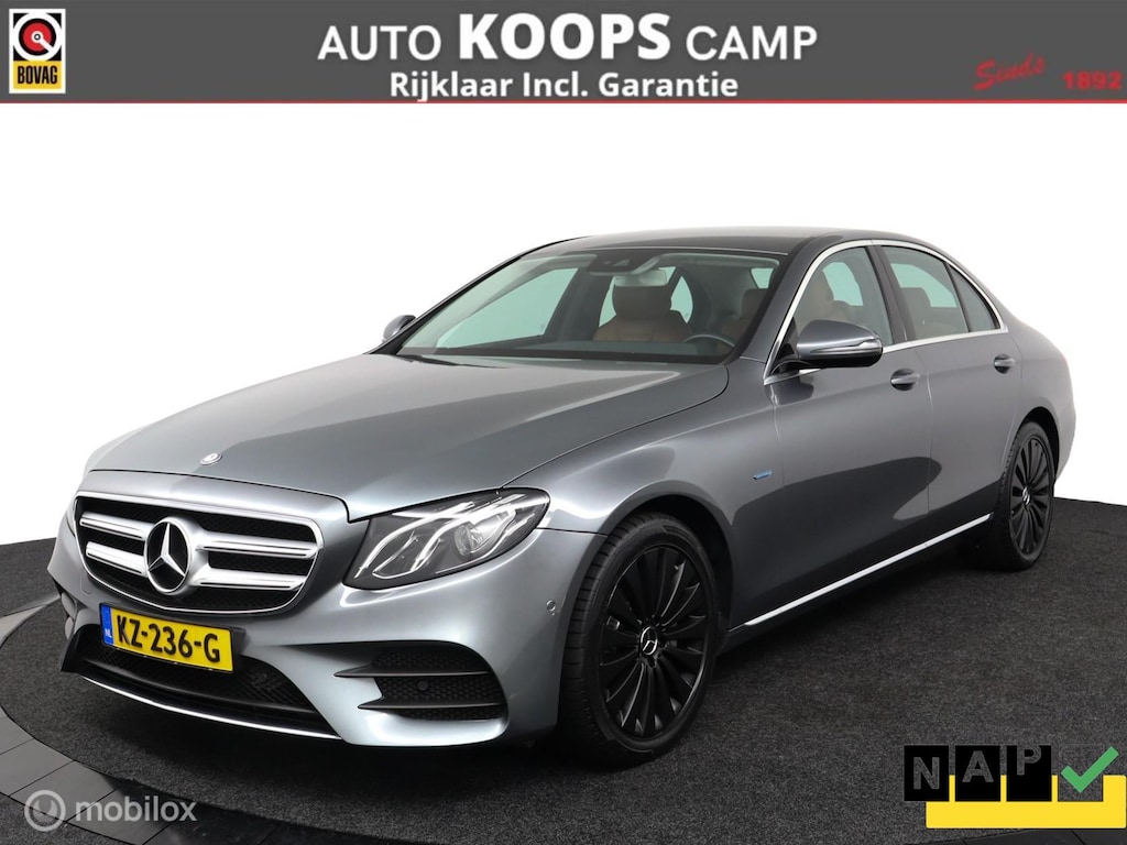 Mercedes-Benz E-klasse E350 e 286Pk Plug-in hydride | Gereviseerde accu | Luchtvering | Ambient Light | PDC V&A | Led verlichting | Bruin-leder | Essenhout | DEALER-STAAT