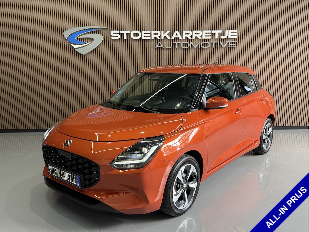 Suzuki Swift 1.2 Comfort + Hyb | Aut | Navi | 16" | Carplay | Stoelverwarming | ACC | Dodehoek | 100% Suzuki Onderhouden!