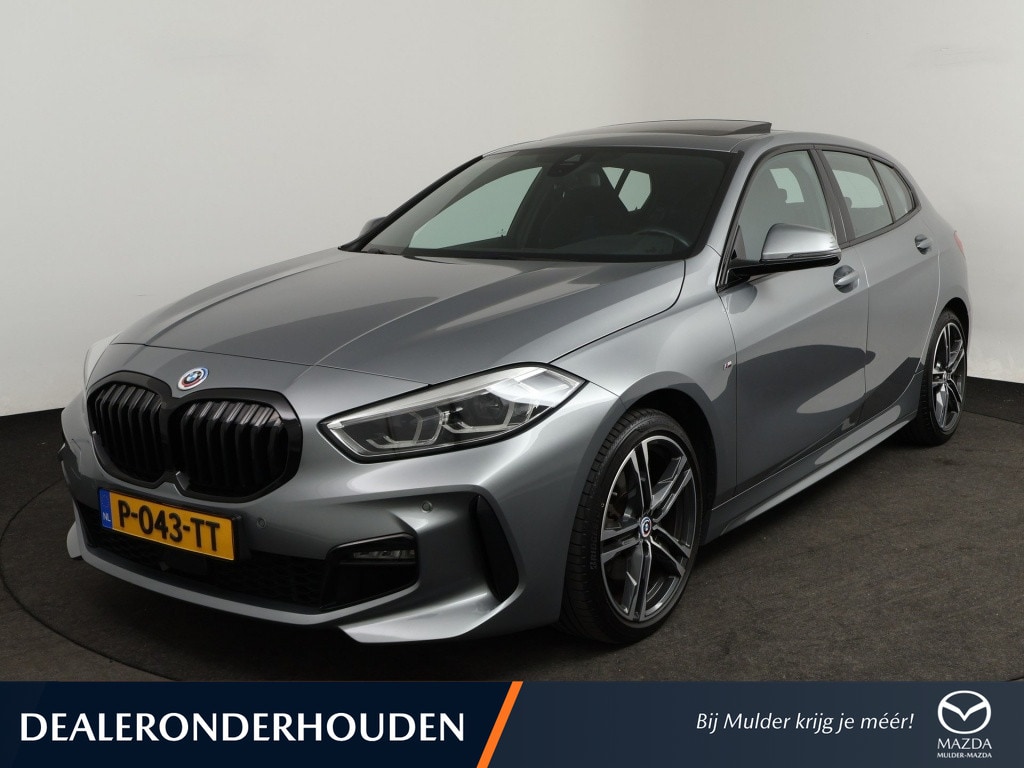 BMW 1-Serie 118i Business Edition | M-Sport • Schuifdak • LED • CarPlay • Sportstoelen