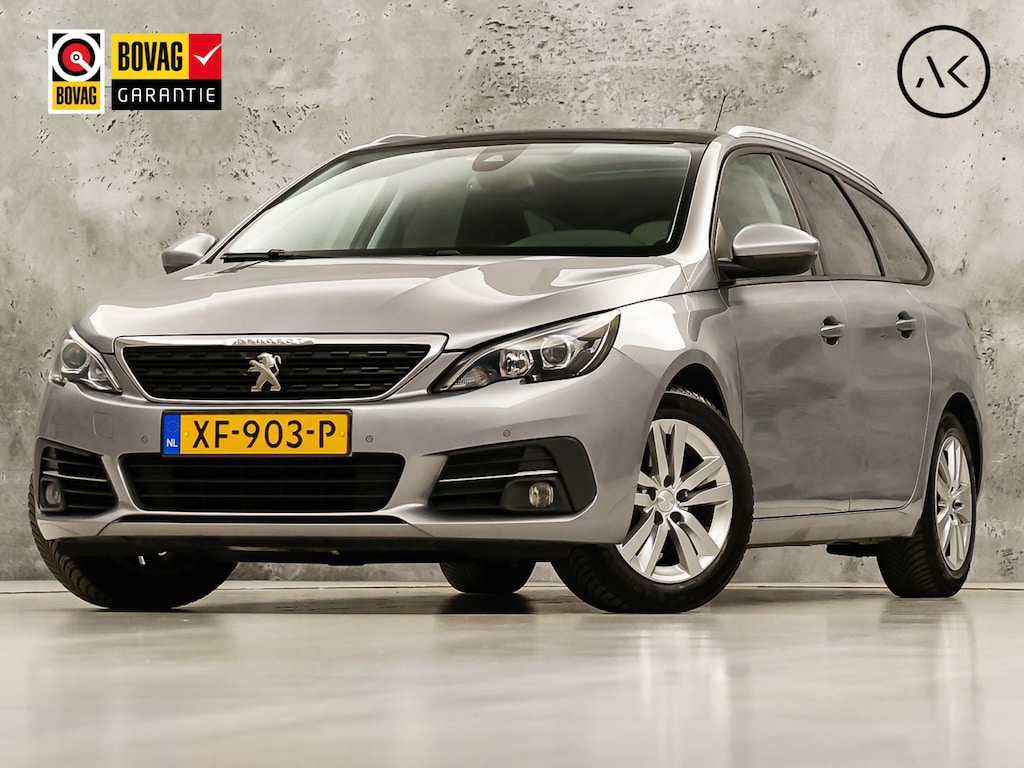 Peugeot 308 SW 1.2 PureTech Luxury Sport (GROOT NAVI, PANORAMADAK, CRUISE, CLIMATE, LM VELGEN, LANE ASSIST, GETINT GLAS, NIEUWE APK, NIEUWSTAAT)