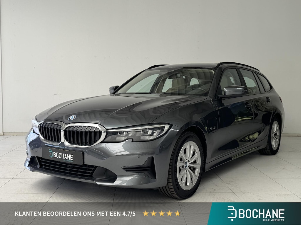 BMW 3-Serie Touring 330e Business Edition Plus | Leder | Achteruitrijcamera | Panoramadak | Stoelverwarming |