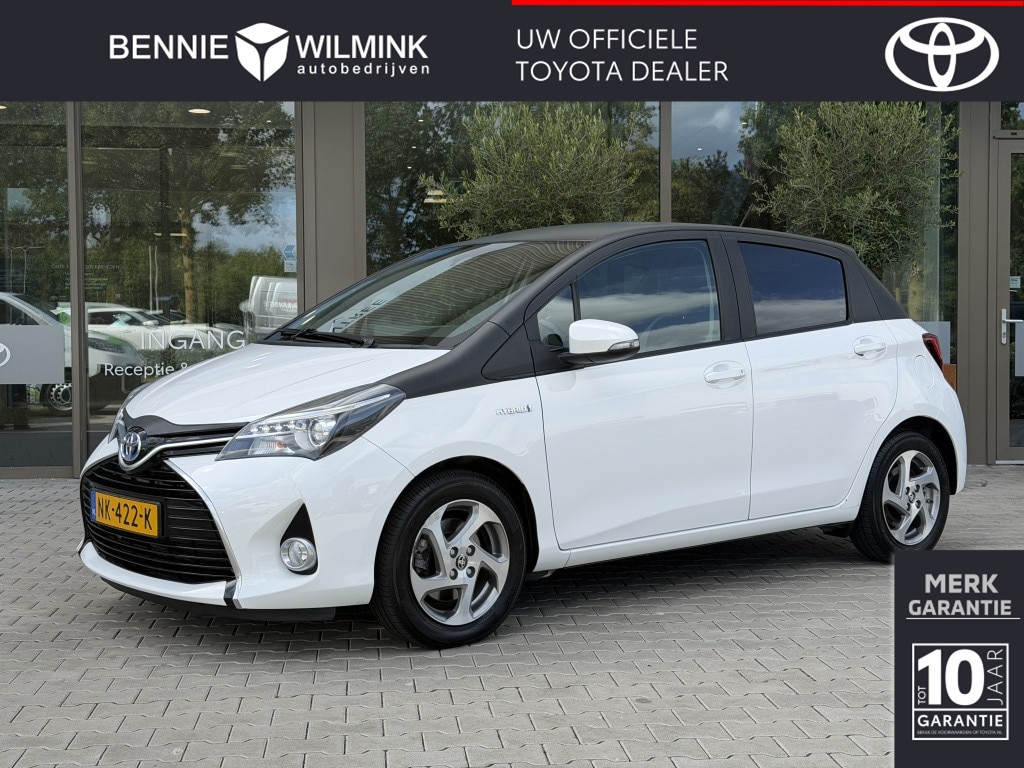 Toyota Yaris 1.5 Hybrid Trend Bi-Tone | Leer | Navigatie | LM Velgen