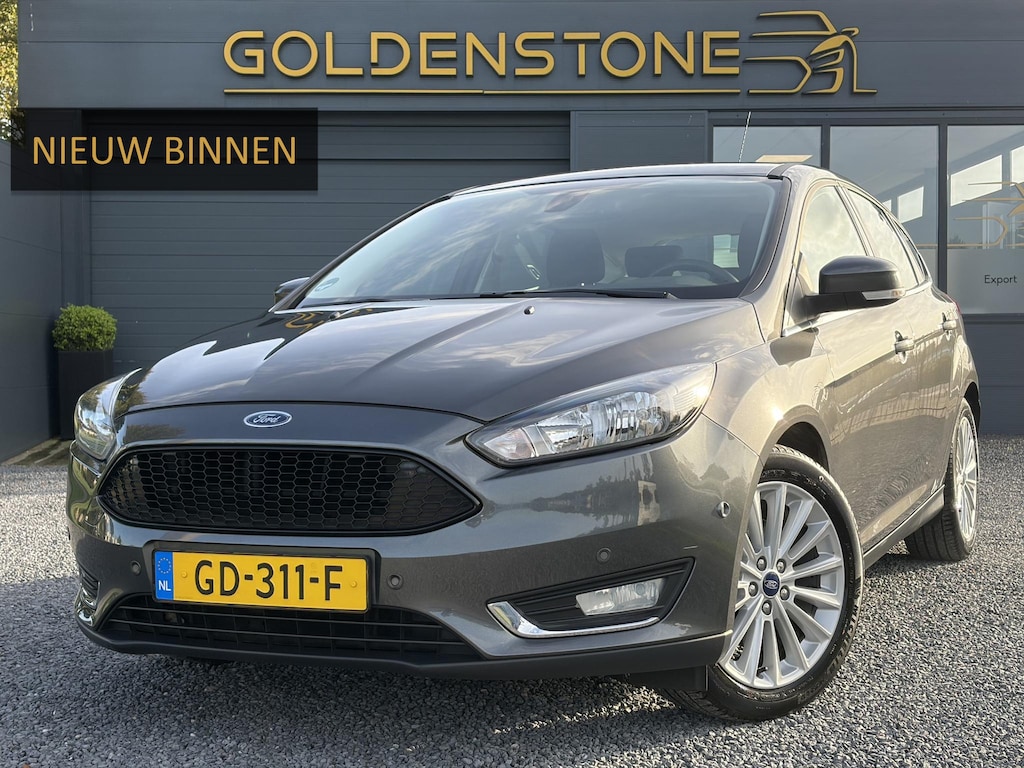 Ford Focus 1.5 Titanium Edition ✓150pk✓Navi✓Clima✓Cruise✓6 Bak✓Pdc V+A✓17'' Lm velgen✓N.A.P✓Apk tot 11-2027