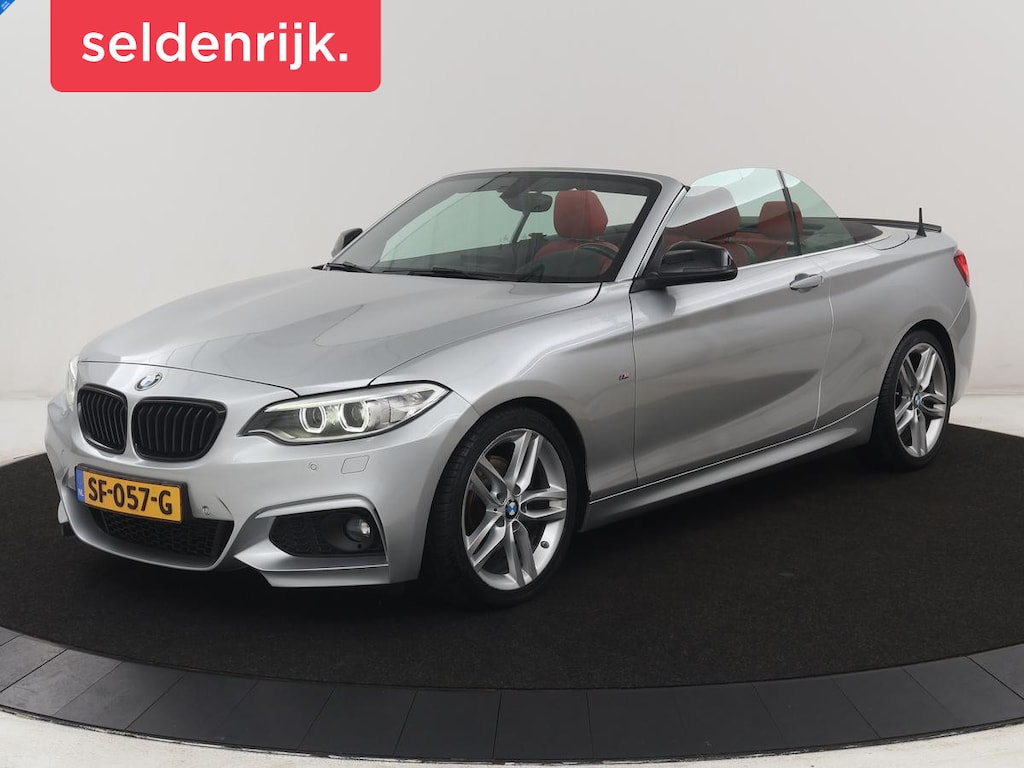 BMW 2-Serie Cabrio 220i | M-sport | Leder | Stoelverwarming | Cruise control | Camera | Park assist | Navigatie | Bluetooth | Climate control