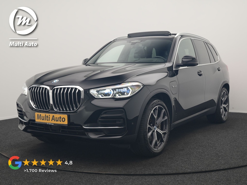 BMW X5 xDrive45e High Executive PHEV 395pk Dealer O.H. | Active Steering | Trekhaak Af Fabriek | Panodak | Luchtvering | Head Up | Adaptive Cruise | 360 Camera | Laser LED | Nappa Lederen Comfortstoelen Memory & Verwarmd | Adaptief Onderstel | Keyless | Sfeerverlichting | Apple Carplay | 21"L.M | Plug In Hybrid |