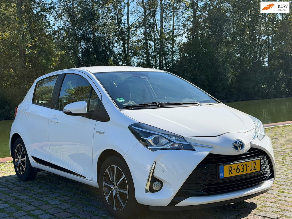 Toyota Yaris 1.5 Hybrid Active 1e eigenaar dealer onderhouden achteruit camera navigatie cruis control stoelverwarming airco