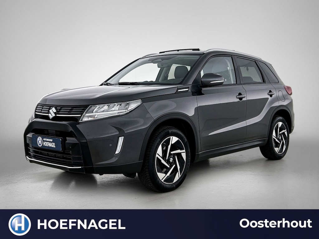 Suzuki Vitara 1.4 Boosterjet Style Smart Hybrid | Adaptive Cruise | Stoelverwarming | CarPlay | Camera | Panoramadak | Trekhaak