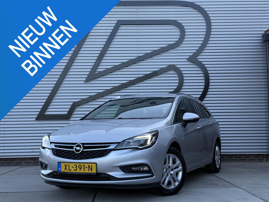 Opel Astra Sports Tourer 1.4 Turbo Online Edition 2e Eigenaar|Navi|Trekhaak|Clima|Cruise|Carplay|PDC|Elek ramen|N.A.P|APK tot 01-2027
