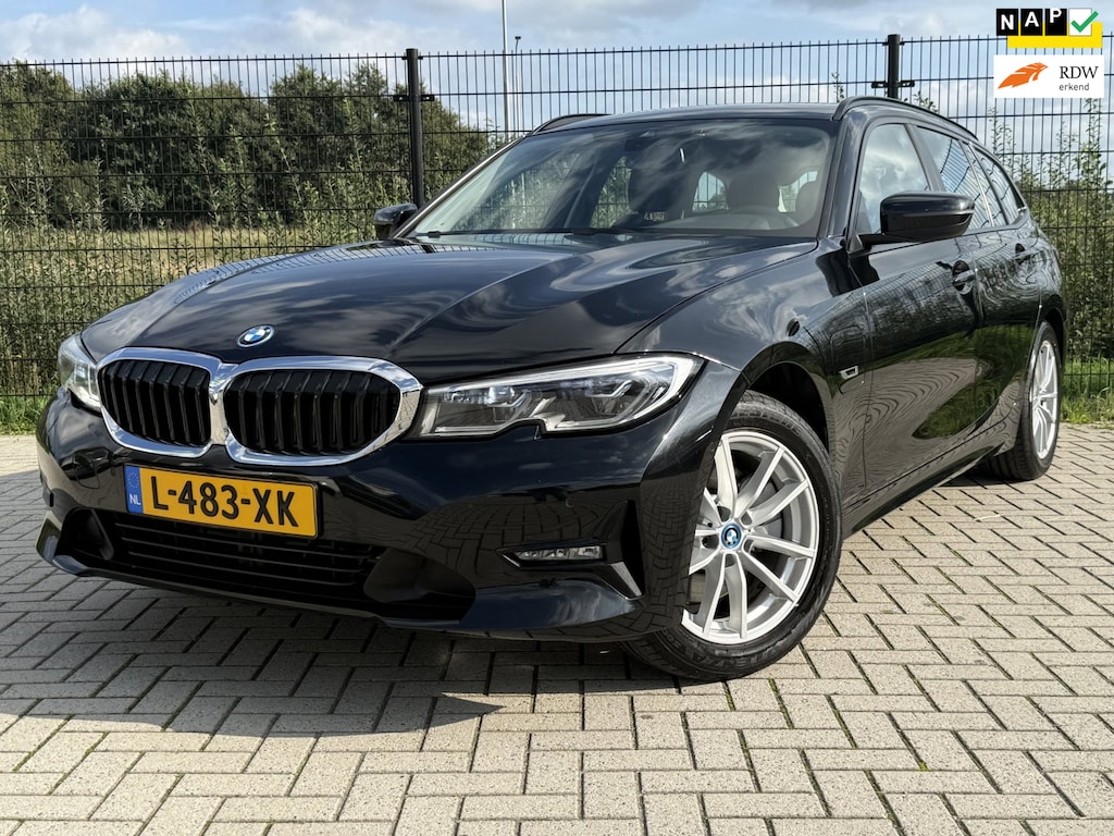 BMW 3-Serie Touring 320e Business Edition Plus | Camera | Laser | Stoelverwarming | Carplay |