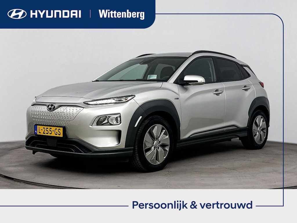 Hyundai Kona Electric EV FASHION 64 kWh <| PDC | 3 FASE | WARMTEPOMP | LEDER | CAMERA | CLIMA | CRUISE ADAPT. | NAVI | PRIVACY GLASS | DAKRAILING | APPLE CAR PLAY & ADROID AUTO | DODEHOEKSPIEGELS |