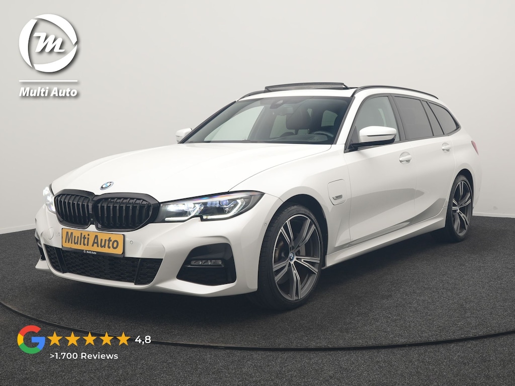 BMW 3-Serie Touring 330e M Sport PHEV 293pk Dealer O.H. | Panodak | Laser LED | Head Up | Adaptief Onderstel | Camera | Lederen Sportstoelen & Stuur Verwarmd | Sfeerverlichting | Keyless | BLIS | Apple Carplay | Virtual | Navigatie | DAB | Plug In Hybrid |