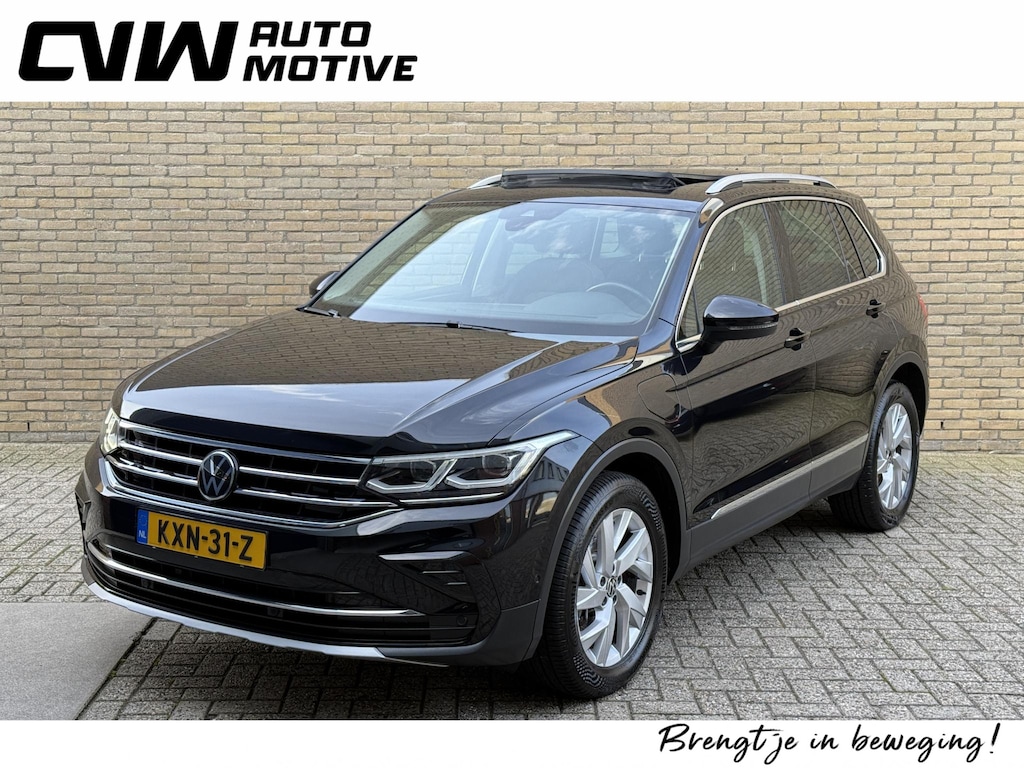 Volkswagen Tiguan 1.4 TSI eHybrid 245pk Elegance Business+ | Panoramadak | Trekhaak wegklapbaar | Virtual cockpit | Adaptieve cruise | Camera | Navigatie | Apple CarPlay | Stoel&stuurverwarming | Keyless | DAB | Sfeerverlichting | IQ-light | Elektrische achterklep | Volledig onderhouden