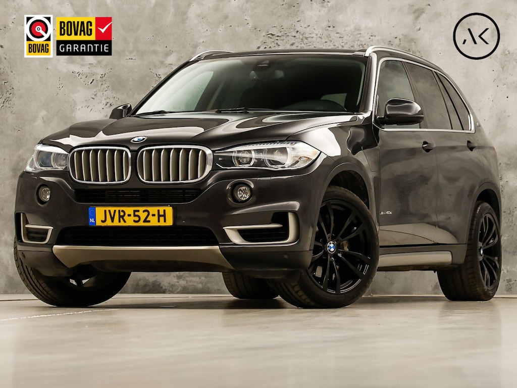 BMW X5 xDrive40e iPerformance High Executive 313Pk Automaat (GROOT NAVI, HEAD-UP DISPLAY, COMFORTSTOELEN MET GEHEUGEN, SFEERVERLICHTING, CAMERA, STOELVERWARMING, GETINT GLAS, NIEUWSTAAT)