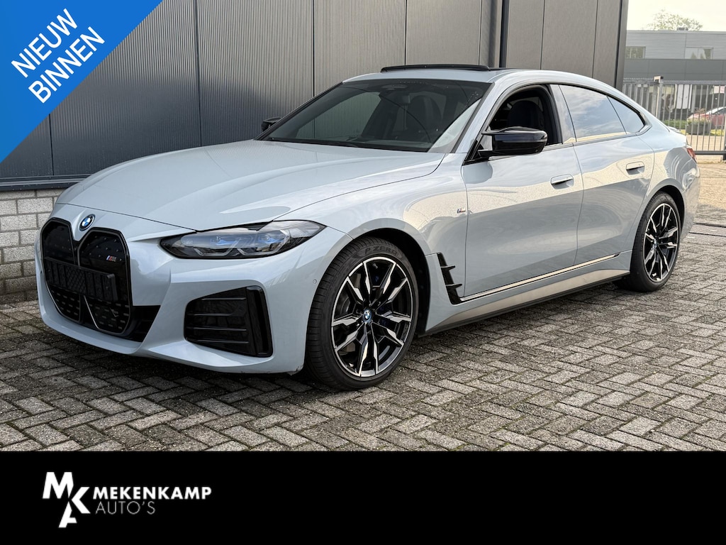 BMW i4 M50 High Executive 84 kWh 19"/SOH 99%/Schuif-kanteldak/Trekhaak/Leder + memory/Stoel + stuurverwarming/Harman Kardon/Dodehoek/Adaptieve cruise/Keyless/360 camera
