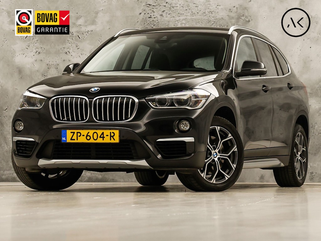BMW X1 sDrive20i High Executive 192Pk Automaat (GROOT NAVI, HEAD-UP DISPLAY, LEDER, STOELVERWARMING, SPORTSTOELEN, GETINT GLAS, TREKHAAK, VIRTUAL COCKPIT, CRUISE, NIEUWSTAAT)