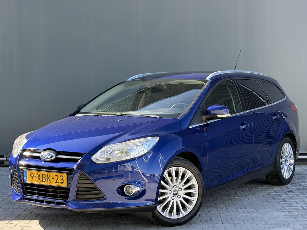 Ford Focus Wagon BWJ 2014 | 1.0T 126PK TITANIUM | TREKHAAK | CLIMA | NAVI | PDC 2X | DONKER GLAS | LICHTMETAAL |
